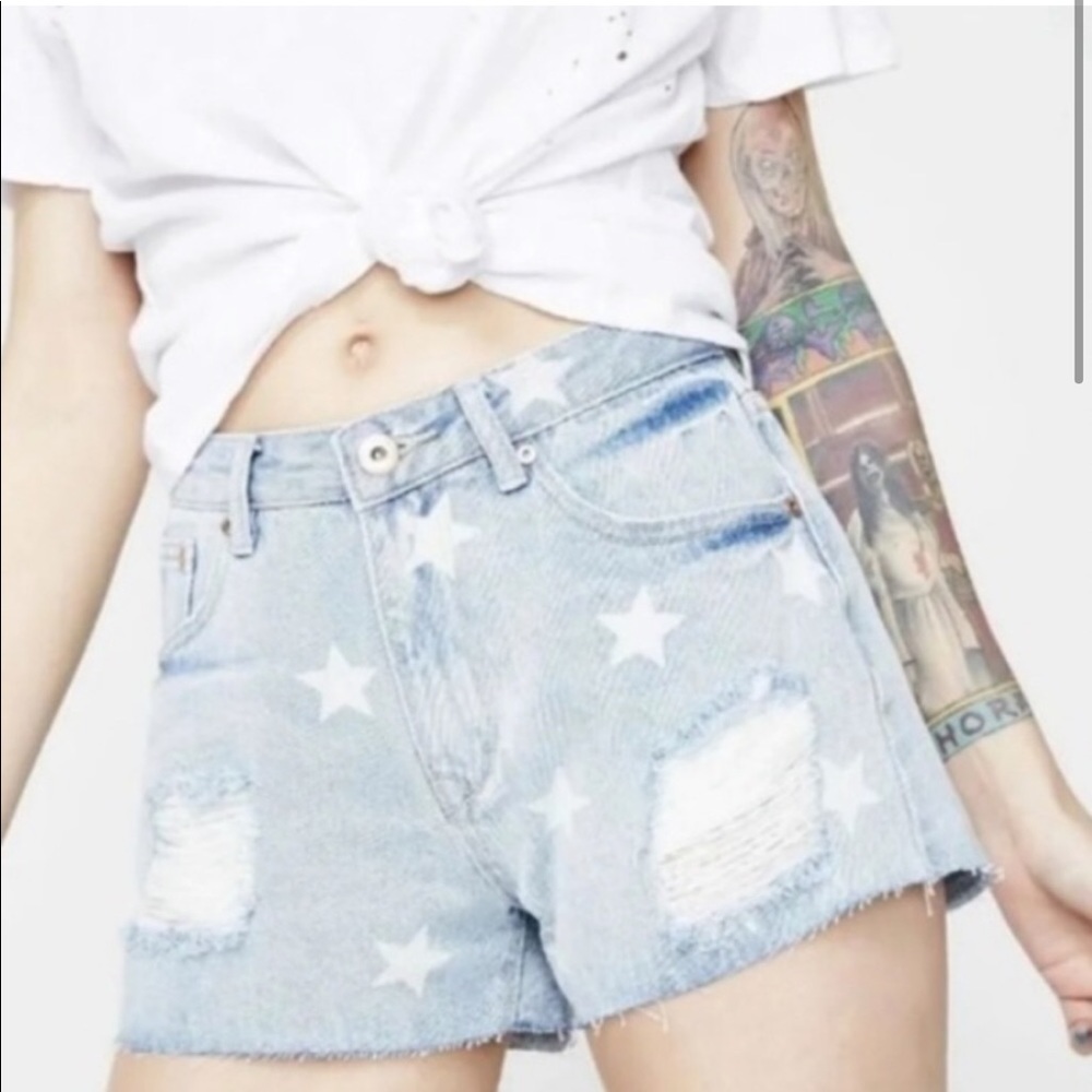 High waisted denim shorts, light wash distressed